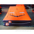Throw-overboard inflatable life raft